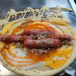 โตเกียวใส่ไข่ไส้กรอกหมู