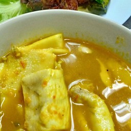 แกงส้มปลากระพงยอดมะพร้าว