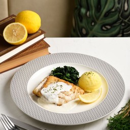 Pan-Fried sea bass butter white sauce
