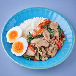 ข้าวหมูผัดใบยี่หร่า ไข่ต้มยางมะตูม