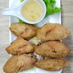 ปีกกลางทอด