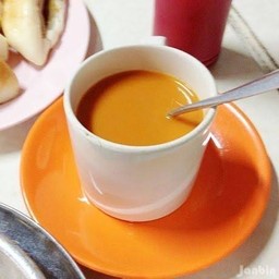 ชานมร้อน (สีส้ม)(18oz.)