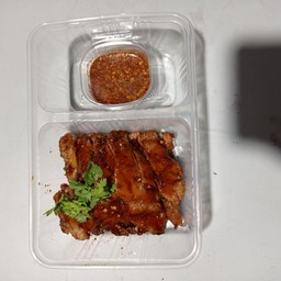 หมูย่างข้าวคั่ว by กาญจนา