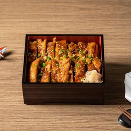 Pan-fried chicken with buttered teriyaki sauce on rice