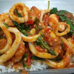Stir-Fried Seafood With Curry Paste (Shrimp, Squid) On Rice