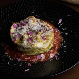 Parmigiana di Melanzane con Fonduta di Pomodorini