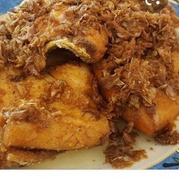 ปลากะพงทอดกระเทียมเปนกับ