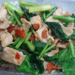 Stir Fried Kale With Pork Slices On Rice
