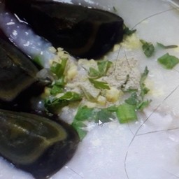 โจ๊กหมู ใส่ไข่เยี่ยวม้า