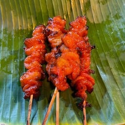 หมูปิ้งหน้าร้านดอกไม้