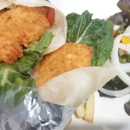 Breaded chicken Fillet Wrap Served with Salad & French Fries