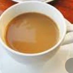 ชาเนสทีนมสดร้อน