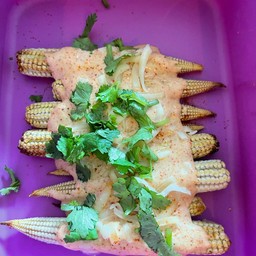 Elotes (Small corn grill with mexican sauce)