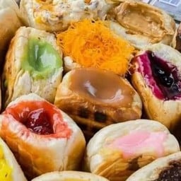 ปังปิ้งหอมเนยใส้บึ้ม