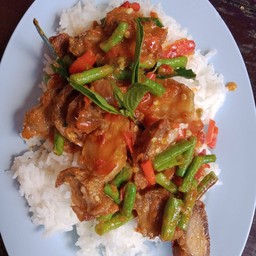 Rice Serve With Stir Fried Crispy Pork And Red Curry Paste