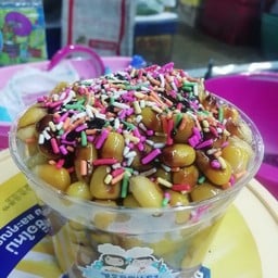 ข้าวโพดคลุกเนยโรยเรนโบว์และซอสช็อคโกแลต