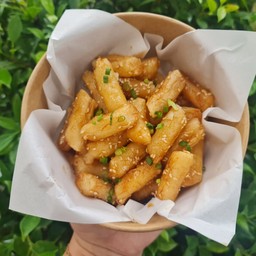 ต๊อกทอดราดซอส