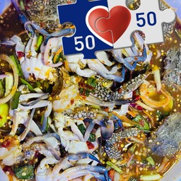 ยำปูม้าสดไหลบัวสูตรน้ำยำปลาร้า ขายดีที่สุดในร้าน