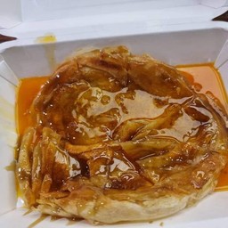 ชุด A โรตีลาวาเนย+ชาดำเย็น 16 ออนซ์