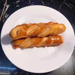 ไส้กรอกไก่รมควันหนังกรอบ (ชิ้นละ)