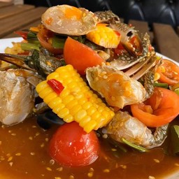 ยำปูม้า ไข่แดง ข้าวโพด ปลาร้า