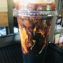 โอเลี้ยงยกล้อ (ราดนมสด)