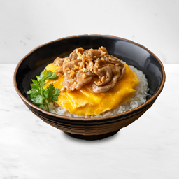 ข้าวหมูทอดกระเทียมพริกไทย ไข่นุ่ม