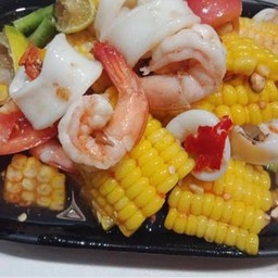 ตำข้าวโพดทะเลปลาร้า  หรือไท