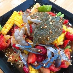 ตำข้าวโพดปูม้ากุ้งสดปลาร้า, ไท