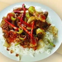 หมูหมักผัดไข่เค็มราดข้าว