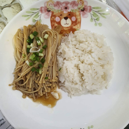 เห็ดเข็มทองผัดเนยราดข้าว
