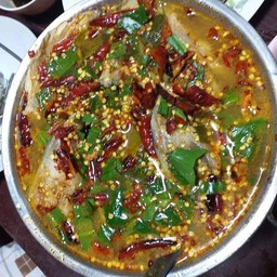 ต้มยำหัวปลาคนกำแพง