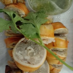 ร้านต้นอ้อทะเลย่างหมึกย่าง