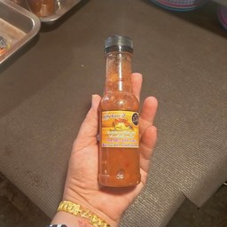 น้ำพริกกะปิ เผ็ดน้อย (ขวดฝาสีดำ)