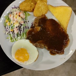 สเต็กหมูพริกไทยดำ (ราคาไม่รวมไข่ไม่รวมนักเก็ต)