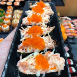 Sushi with Crab Stick Salad Topped with Orange Fish Roe