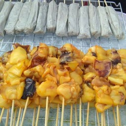 หมึกย่างท่ารถตู้99