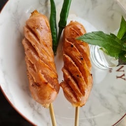 ลูกชิ้นปิ้งแม่ค้าปากแดง -ถ.พัฒนา