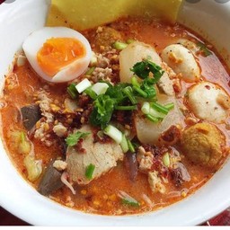 ก๋วยเตี๋ยวต้มยําหมูน้ําข้นใส่ไข่ (พิเศษ)