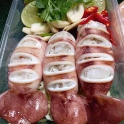ลวกบนตึก หมึกสะดุ้งน้ำ by หมึกย่างผัวหลง