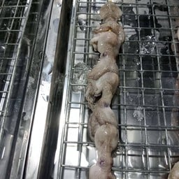 หมึกย่างเตาถ่าน🐙🔥 ตลาดดารา🎪