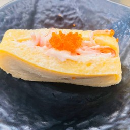 ไข่หวานอินาริสลัดปูอัด