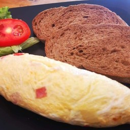 Omelette with cheese and brown breads