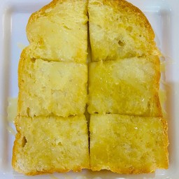 ขนมปังปิ้งเนย + นมข้น