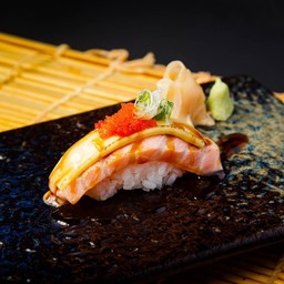 Salmon cheese aburi sushi 1pc.