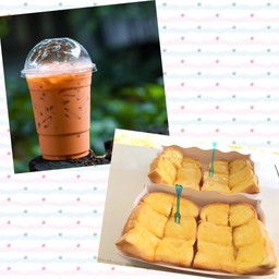 ชาไทย +ขนมปังเนยนม 2 แผ่น