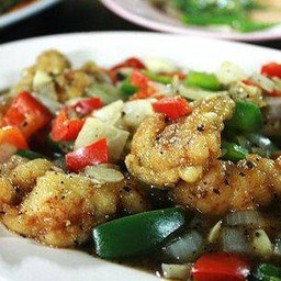 ข้าวปลาทับทิมผัดพริกไทยดำ