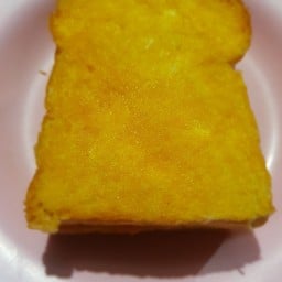 ขนมปังปิ้ง ฉ่ำเนย + น้ำผึ้ง ( 2แผ่น )