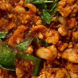 หมูผัดพริกแกงใส่หน่อไม้ราดข้าว