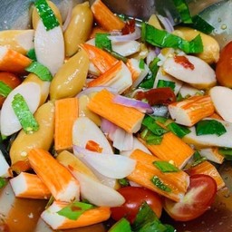 ยำรวมใส้กรอก+ปูอัด+หมูยอ